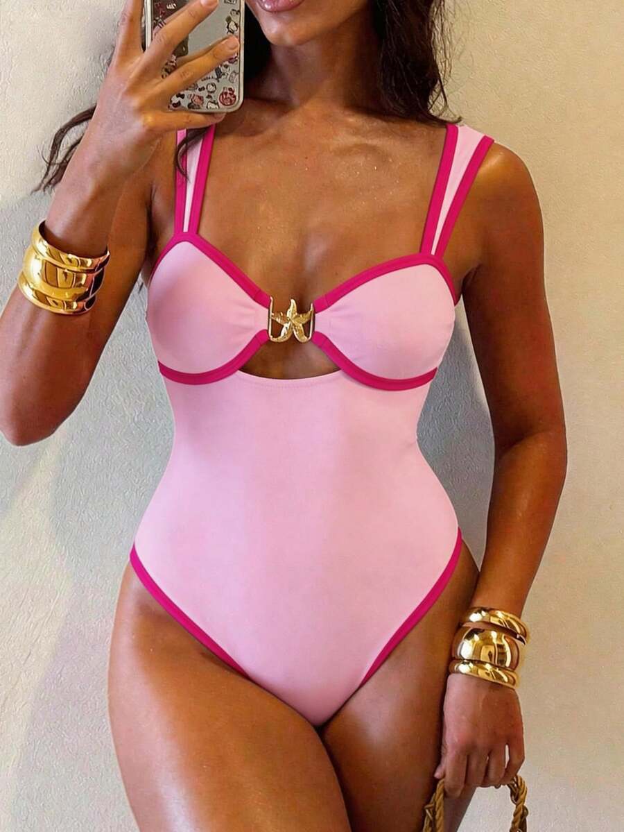 Make a splash this season with our chic 2-piece swimsuit set, designed for the modern beach lover. The coordinated top and high-waisted bottom feature eye-catching contrast trim that elevates your poolside look. The attached skirt adds a playful, feminine touch while providing extra coverage and confidence. 