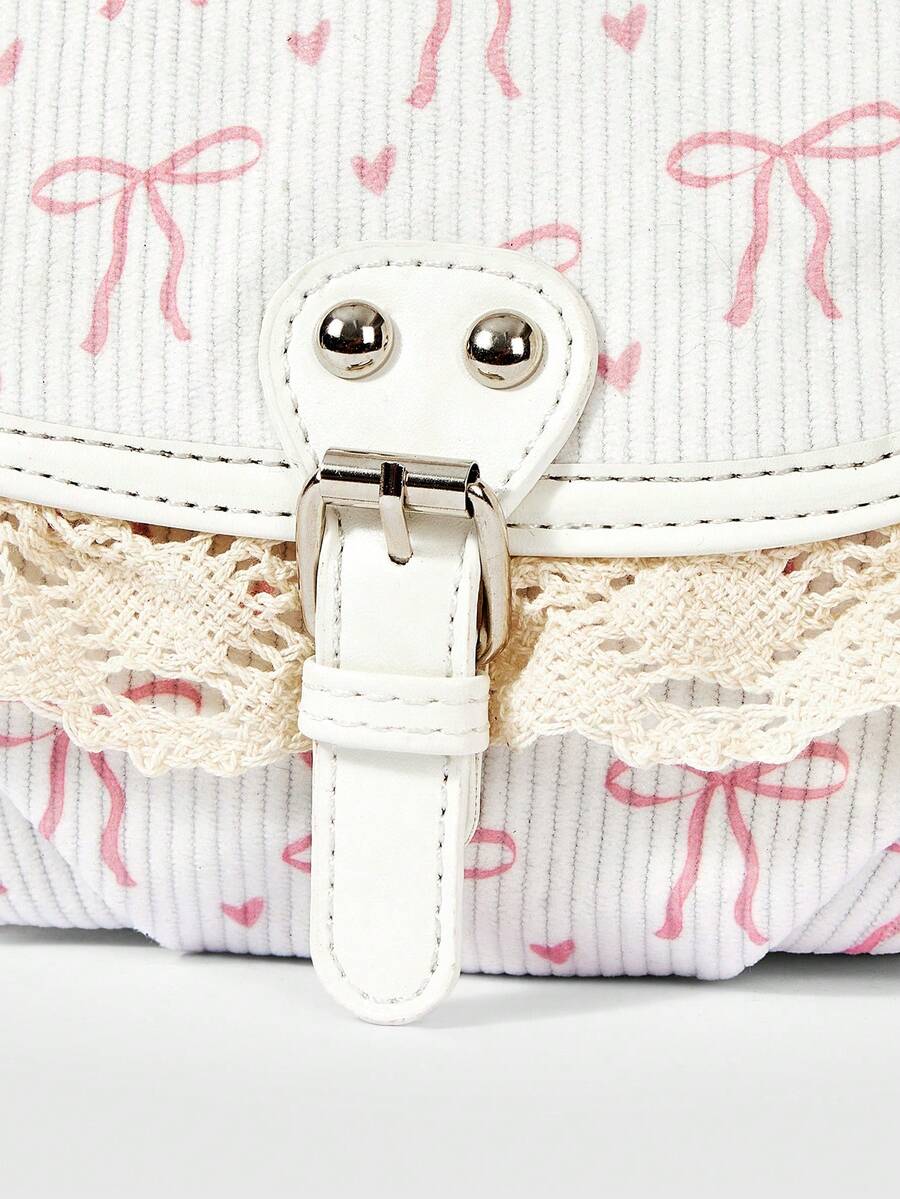 Back view of beige bow print corduroy bag with slip pocket