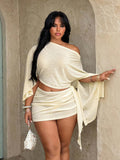 plus size two-piece beach club set with off-shoulder batwing crop top, sheer lightweight mesh or knit fabric, ruched side-tie mini skirt, exposed waist and print or solid color variants image 11