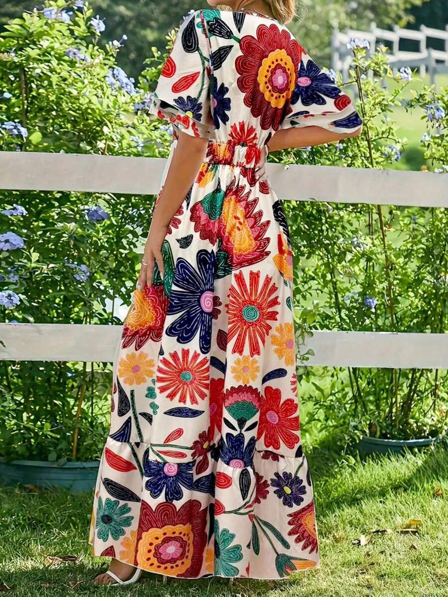 Cream plus size maxi dress with bold multicolor folk floral print flutter sleeves and ruffle hem