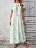 Front view of mint floral boho maxi dress with relaxed short sleeves