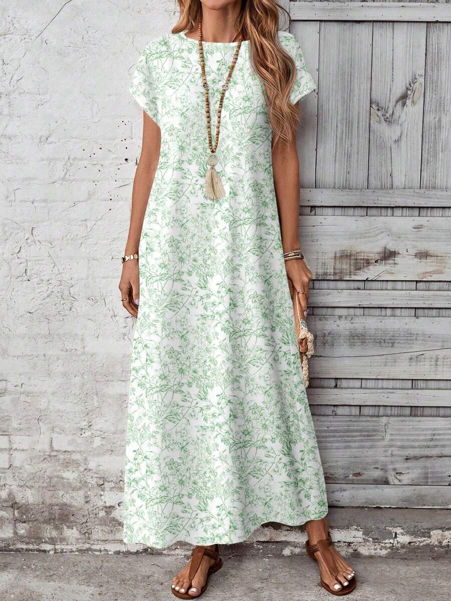 Front view of mint floral boho maxi dress with relaxed short sleeves