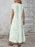 Back view of mint floral loose maxi dress with allover print
