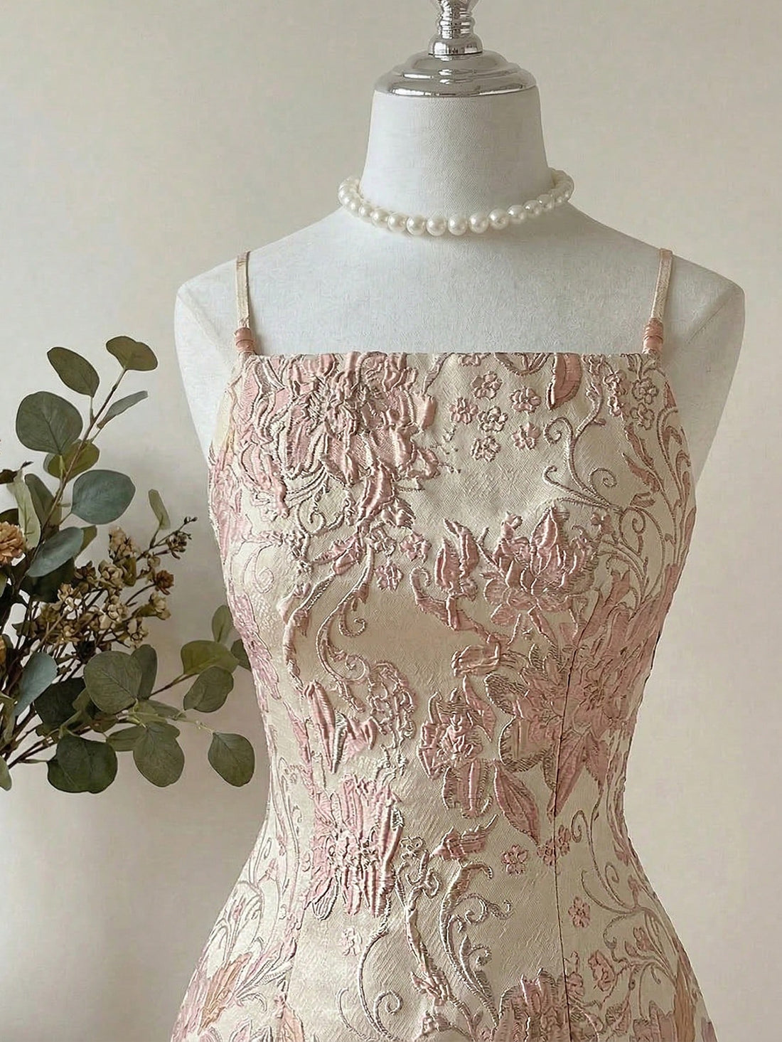 Elevate your special occasion with this stunning pink jacquard A-line dress. The delicate beaded embellishments catch the light beautifully, creating an enchanting shimmer perfect for weddings, bachelorette celebrations, and prom nights. The classic A-line silhouette flatters every figure while the intricate jacquard fabric adds sophisticated texture and dimension. Whether you're a guest of honor or celebrating in style, this dress combines timeless elegance with modern glamour for an unforgettable look.
