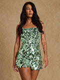 Front view of mint green sequin camisole romper
