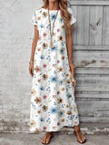 Front view of blue tan vine floral maxi dress with round neck