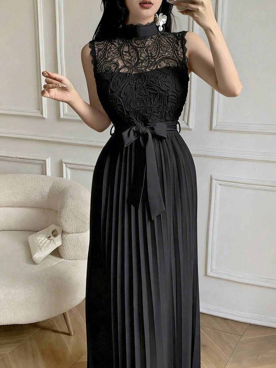 Styled view of lace bodice pleated maxi dress showing visible color, print, and silhouette