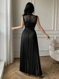 Styled view of lace bodice pleated maxi dress showing visible color, print, and silhouette