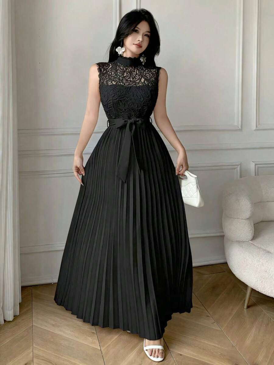 Styled view of lace bodice pleated maxi dress showing visible color, print, and silhouette