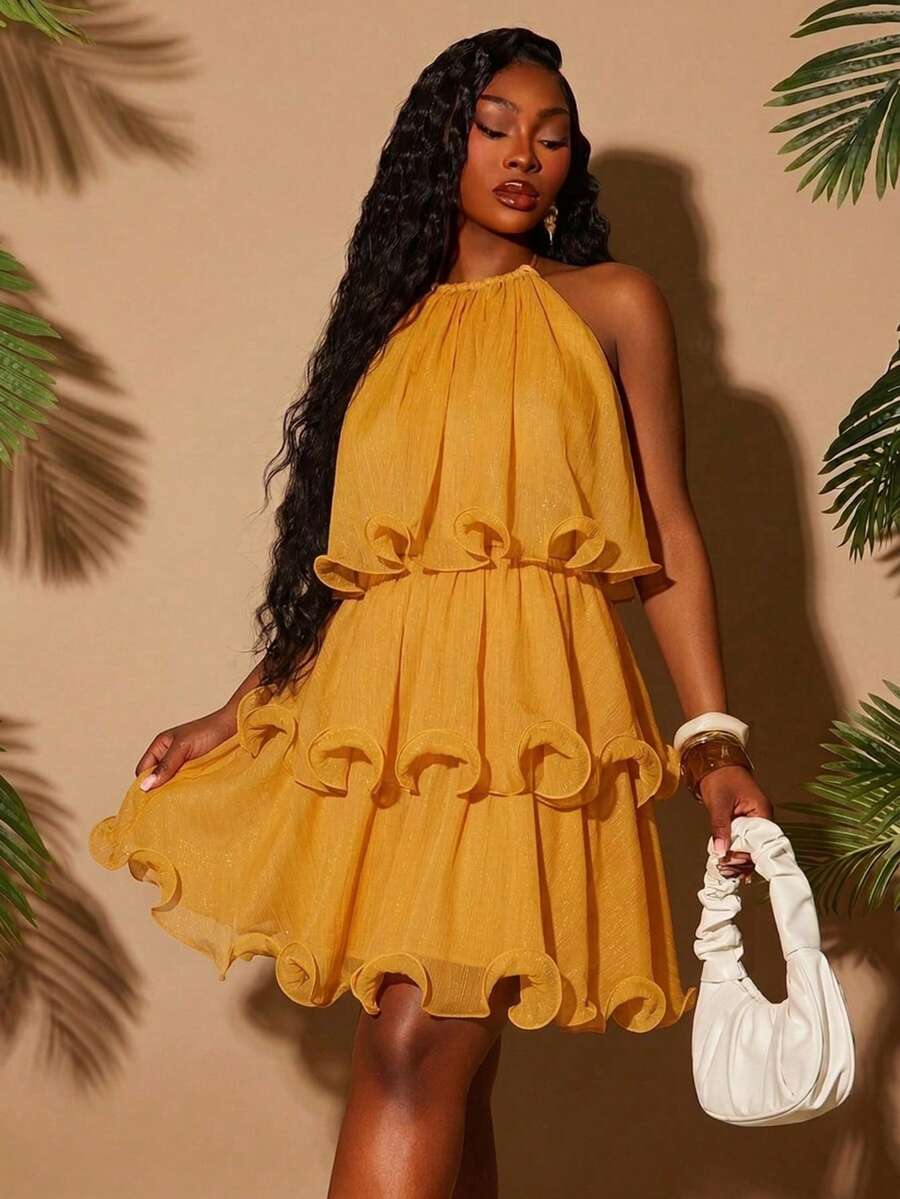 Experience the breathtaking fusion of solar-inspired heritage and sharp, modern architectural tailoring. This stunning yellow halter dress is meticulously designed for the woman who values a high-fashion, "quiet luxury" approach to inclusive dressing—the ultimate centerpiece for prestigious garden weddings, exclusive spring brunches, and high-authority summer social gatherings.