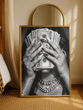 Black and white woman obscured by stacked U.S. dollar bills in gold frame