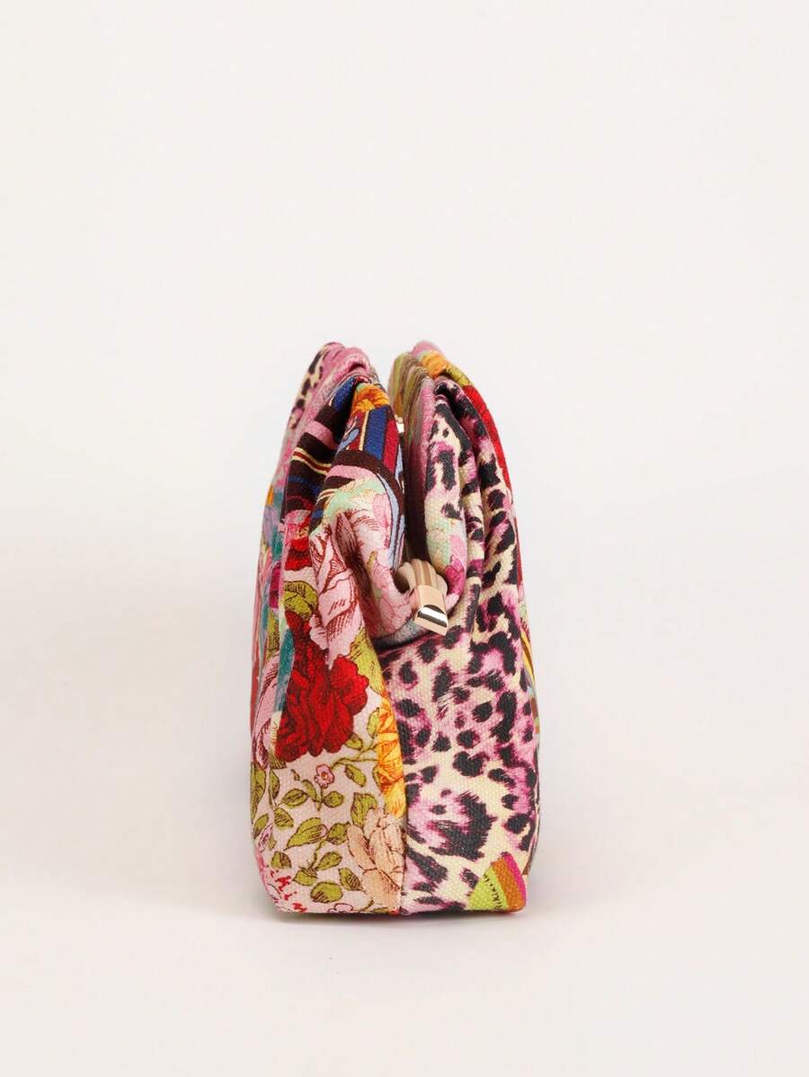 Side view patchwork fabric ruffle clutch pouch showing gathered top puffy body and gold zipper pull