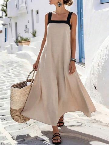 Beige sleeveless maxi dress with black square neckline and wide straps