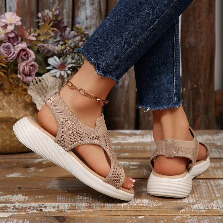 Rear side view of taupe breathable mesh sandals with white platform soles