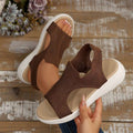 Top view of coffee brown mesh slingback wedge sandals shown held and worn