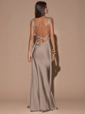Back view of brown sleeveless deep V-neck maxi dress with crossed open back, shown for wedding and evening wear