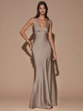 Front view of brown sleeveless deep V-neck maxi dress with crossed open back, shown for wedding and evening wear
