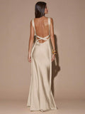 Back view of yellow sleeveless deep V-neck maxi dress with crossed open back, shown for wedding and evening wear