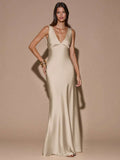 Front view of yellow sleeveless deep V-neck maxi dress with crossed open back, shown for wedding and evening wear