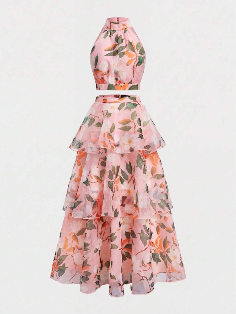 Back view of aqua floral crop top with zipper and layered long skirt