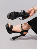 Black lace panel platform sandal view 2 with open toe and ankle strap