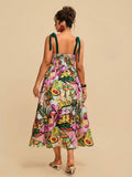 Back view of multicolor floral dress with green tie straps