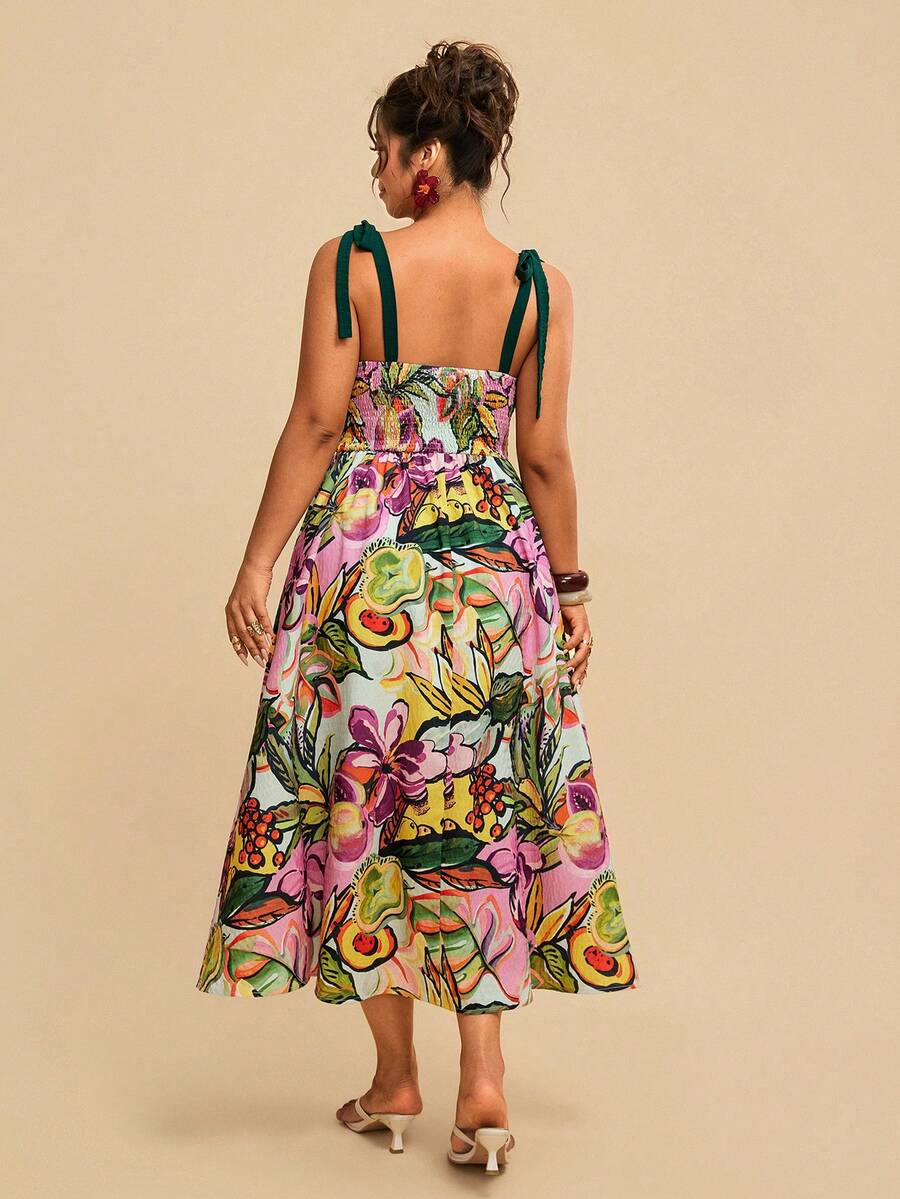 Back view of multicolor floral dress with green tie straps