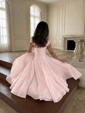 Back View of blush pink colorblock A-line midi dress with cap sleeves for wedding guest styling