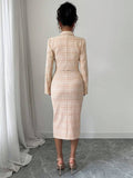 Back view of orange tweed blazer and bodycon dress set