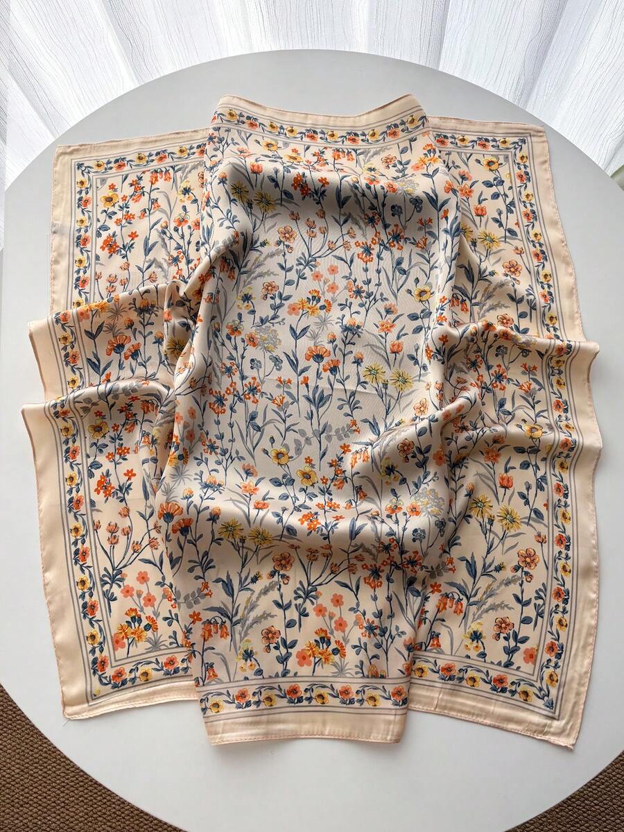 Elevate your spring and summer wardrobe with this elegant silk scarf featuring a vibrant flower print. Crafted from luxurious silk, it drapes beautifully around your neck, shoulders, or hair, adding an instant touch of sophistication to any outfit. The timeless floral design complements casual and dressy looks alike, making it a versatile accessory for every occasion. Lightweight and breathable, it's perfect for warm weather styling while providing gentle UV protection. 