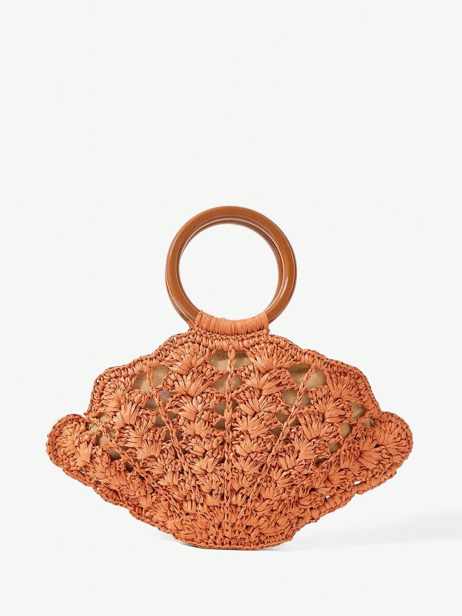 Back view burnt orange woven straw shell bag with brown round handle