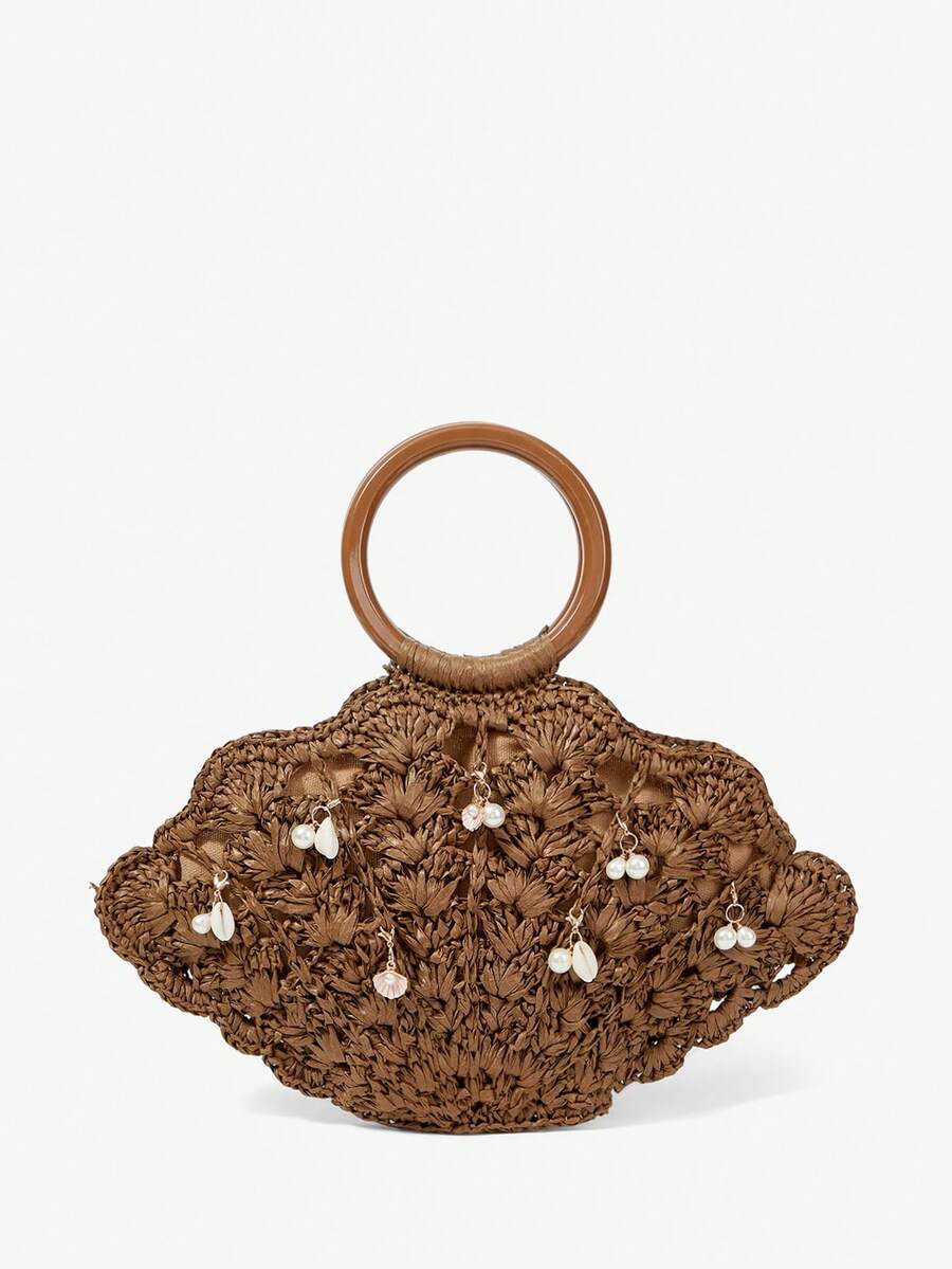 Dark brown straw shell shaped beach bag with pearl and shell charm dangles