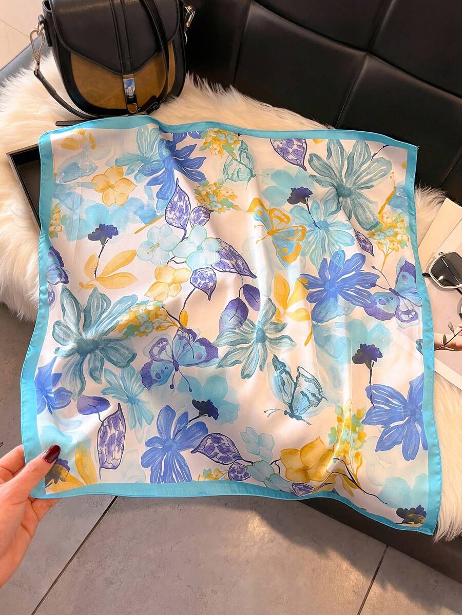 Elevate your spring and summer wardrobe with this stunning floral print faux silk scarf. Featuring vibrant botanical designs, this versatile accessory effortlessly transitions from casual daytime looks to sophisticated evening styles. The lightweight faux silk fabric drapes beautifully, offering a luxurious feel without the premium price tag. Wear it as a headscarf, neck wrap, or tie it to your handbag for an instant style boost. Perfect for adding color and dimension to any outfit