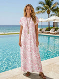 Back view of pink floral maxi dress with full floral coverage
