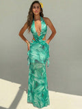 Aqua green lily print halter cutout maxi dress