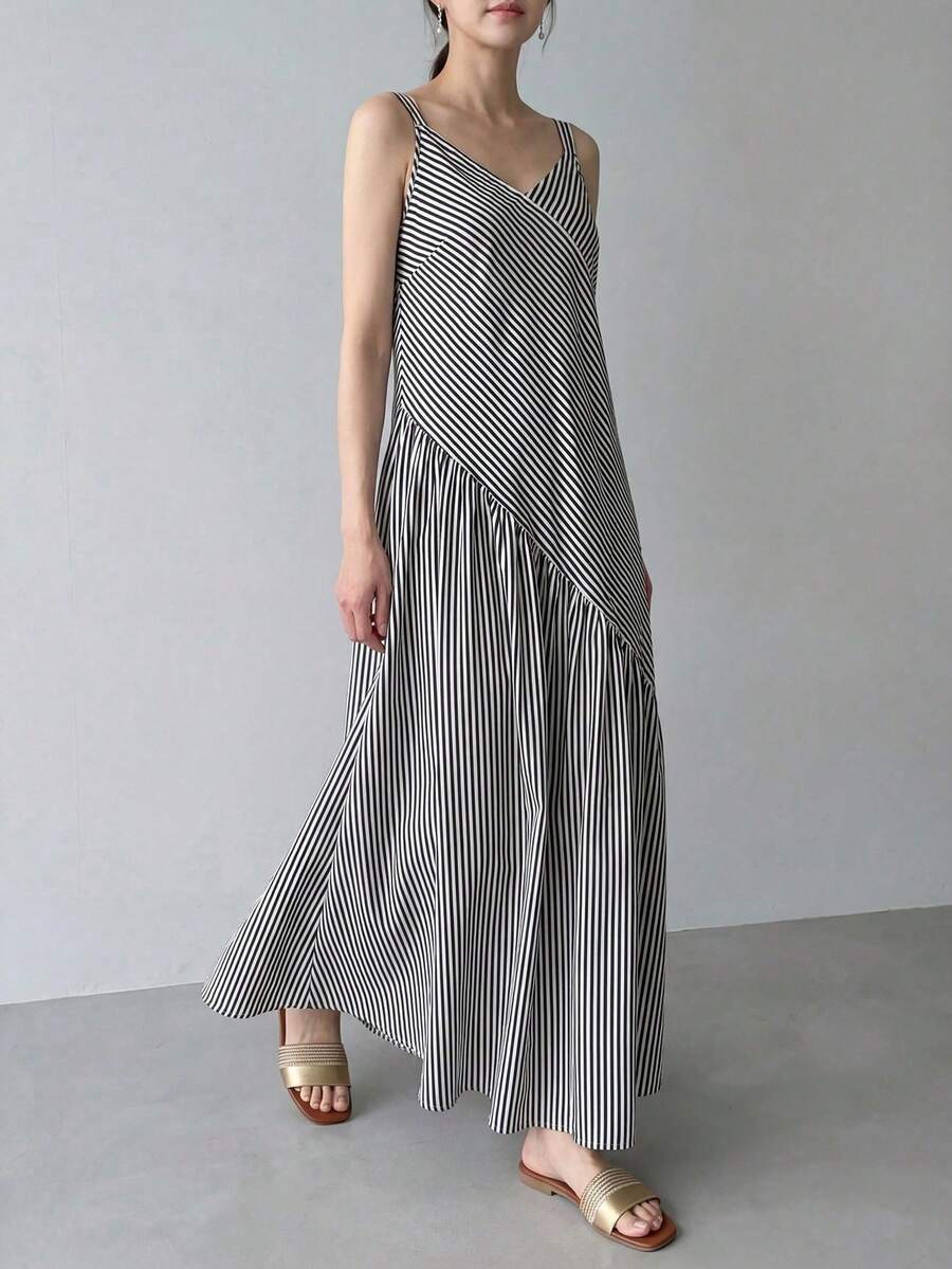 Black and white striped dress side view with swing skirt