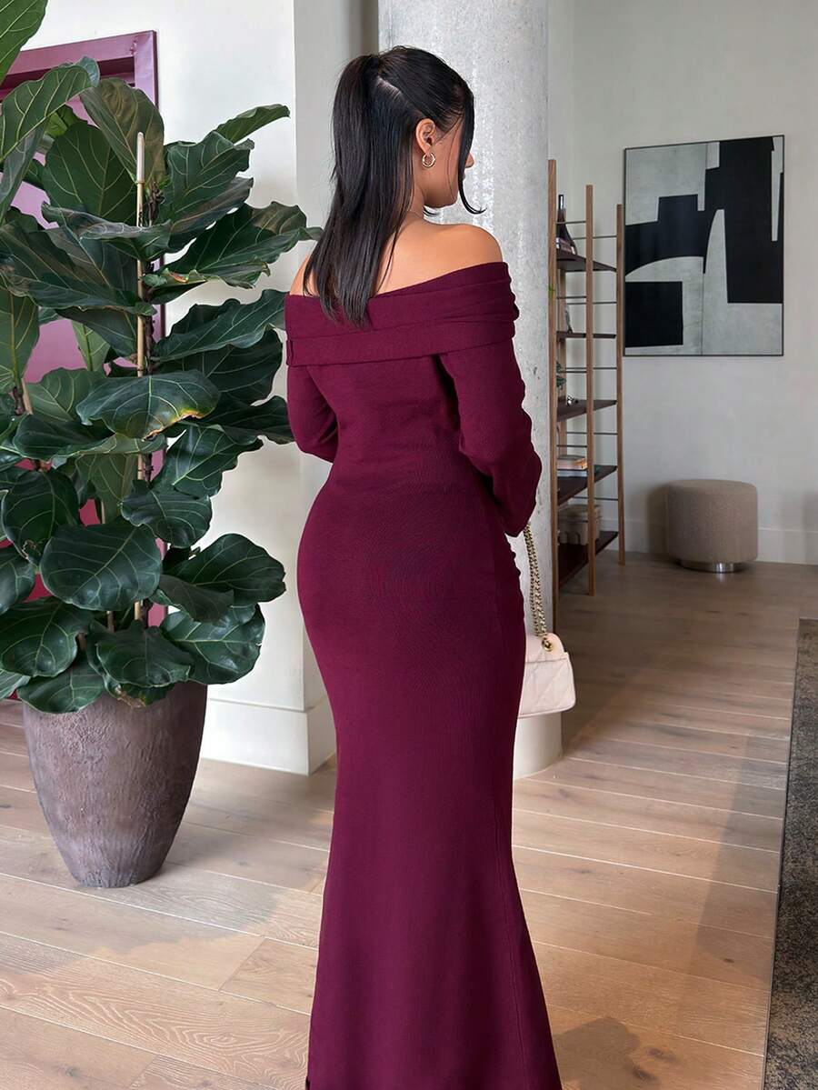 Back view of burgundy off shoulder sweater maxi dress with fitted mermaid shape