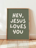 Front view of framed sage green Jesus Loves You Christian canvas print