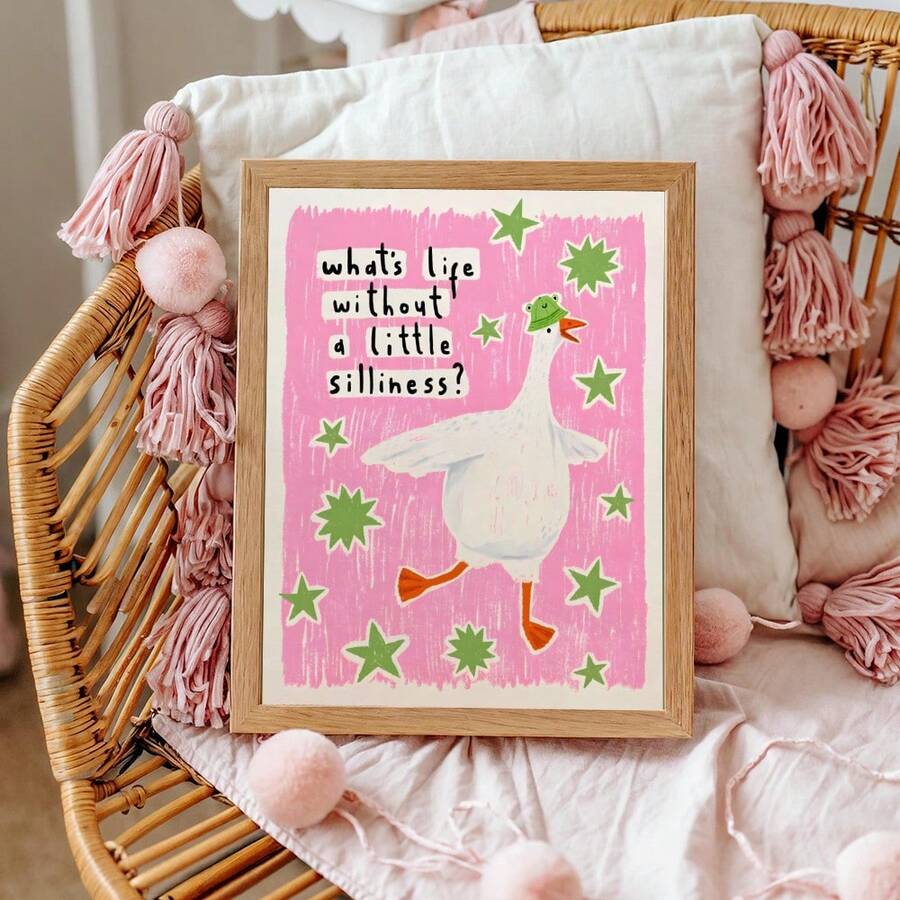 Add a touch of whimsy to any child's space with this charming goose wall art. Featuring a playful silly quote, it brings humor and personality to kids' rooms, nurseries, and playrooms. The vibrant multicolor graphic design appeals to both boys and girls, making it a versatile choice for any decor style. Perfect for birthdays, baby showers, or simply brightening up a bedroom. Easy to display and built to last, this delightful piece sparks joy and imagination in young minds.