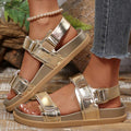 Side close-up of champagne platform sandal showing layered sole and geometric buckle