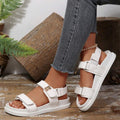 Side profile of white PU leather platform sandals with adjustable rear heel strap