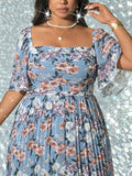 Image 12 - model view of Elegant Plus Size Floral Print Pleated Dress for Women - Romantic and Stylish Fashion Statement