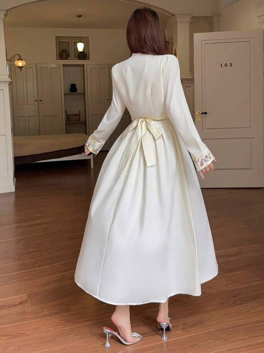 Embroidered dress set with ivory cropped jacket and A-line dress