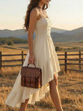 Back view of light blue high low dress with adjustable straps and smocked back