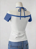 Back mannequin view of white and blue off-shoulder halter top with neck ties and jeans