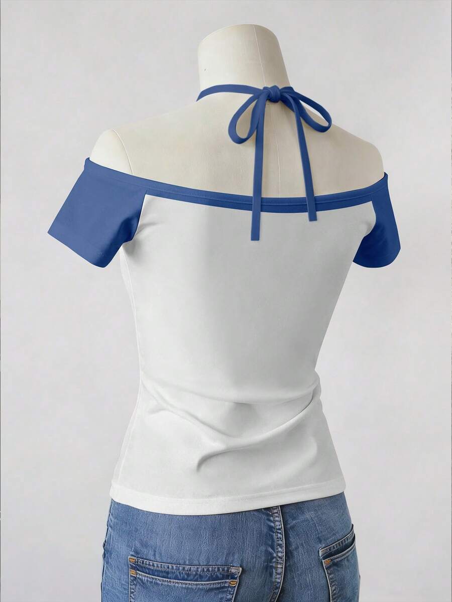 Back mannequin view of white and blue off-shoulder halter top with neck ties and jeans