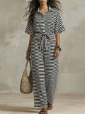 Styled view of striped belted wide-leg jumpsuit showing visible color, print, and silhouette