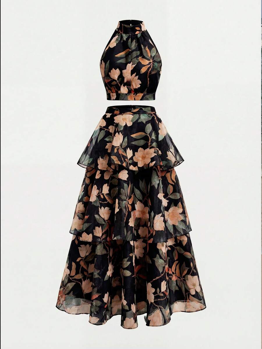 Back view of black floral high-neck crop top and cascading maxi skirt