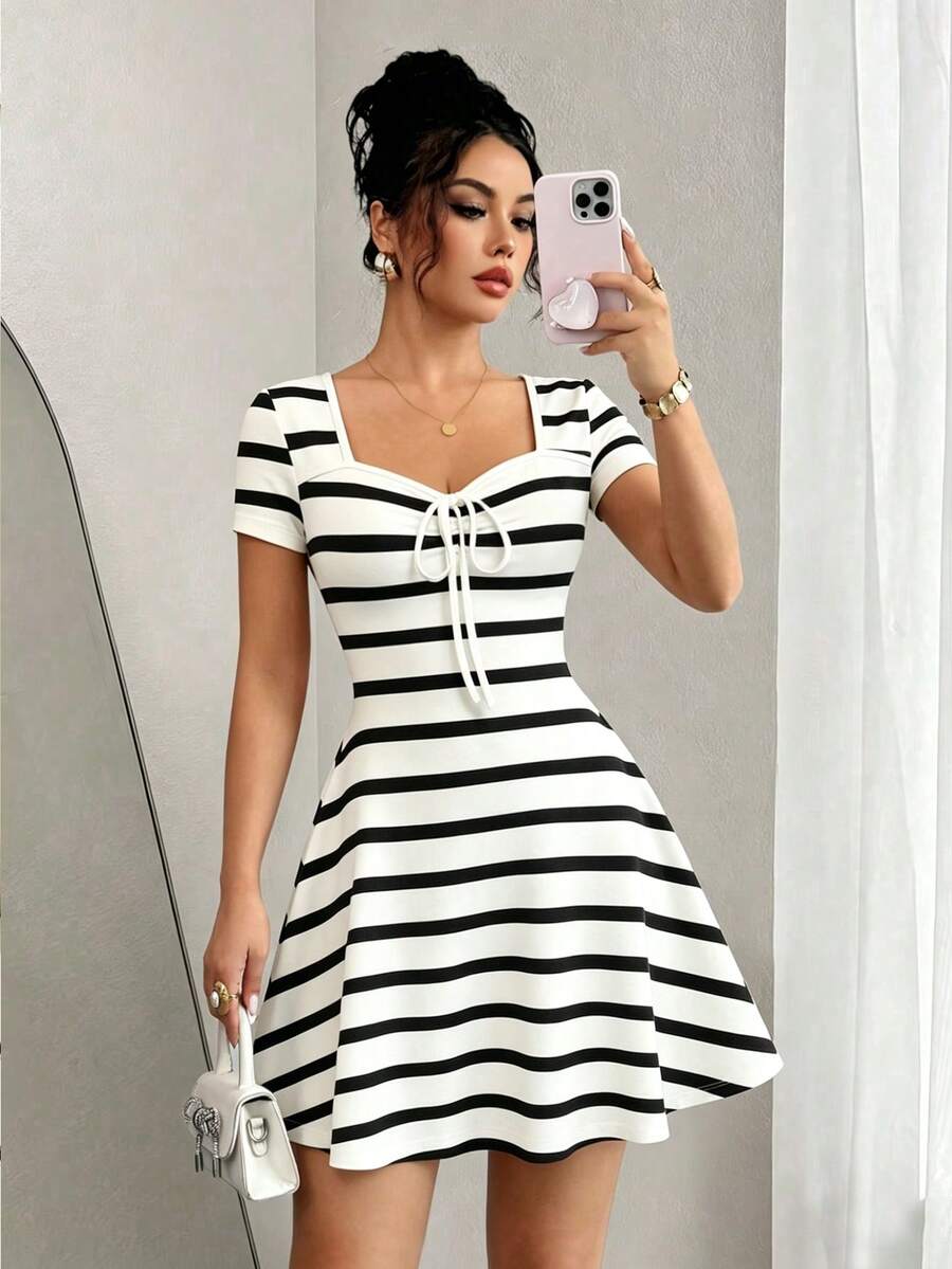 Front view of knitted jacquard mini dress for casual summer days