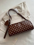 Image 5 - handle detail of Retro Polka Dot Handbag – Chic Versatile Shoulder Bag with Tassel for Summer 2026